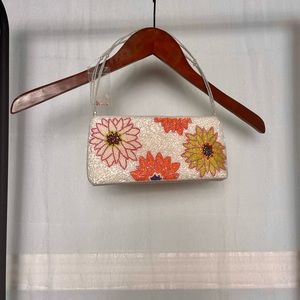 Beaded flower clutch bag